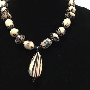 Bead necklace with large focal
